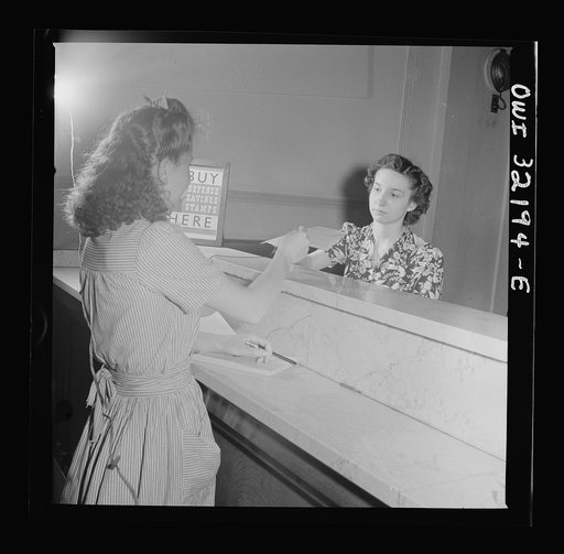 Washington, D.C. A Western Union clerk accepting a telegram