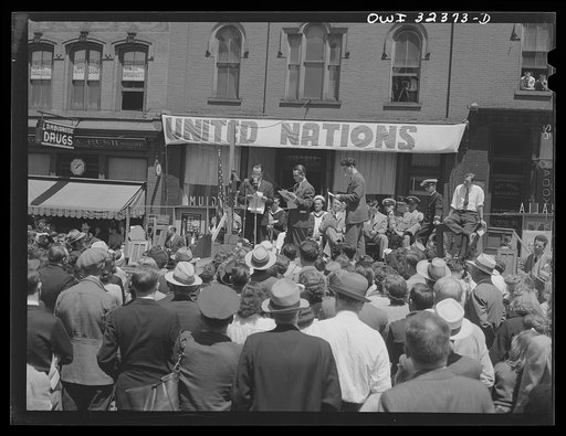 Untitled photo, possibly related to: Oswego, New York. Broadcasting a United Nations message to the nation from a platform for the heroes set up on the street