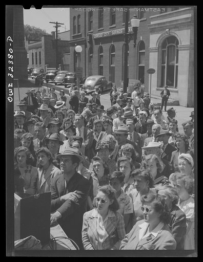 Untitled photo, possibly related to: Oswego, New York. Mayor Scanlon leading Oswegans in reciting a United Nations week pledge which was broadcast to the nation