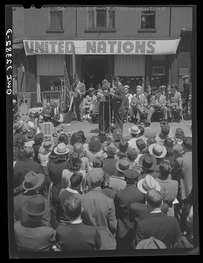 Oswego, New York. Broadcasting a United Nations message to the nation from a platform for the heroes set up on the street