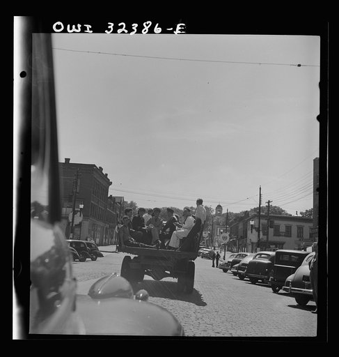 Untitled photo, possibly related to: Oswego, New York. Hay ride for the United Nations heroes and Oswego girls during United Nations week