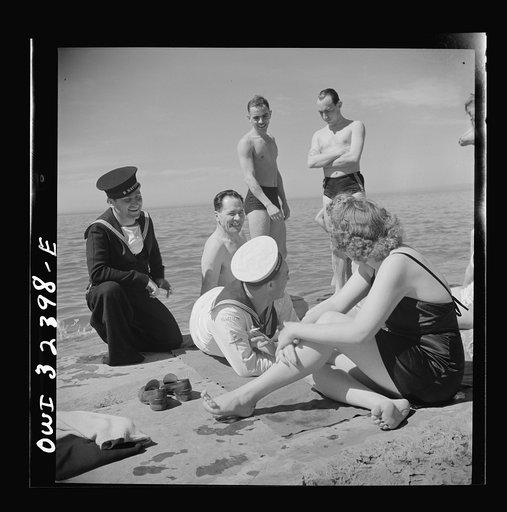 Untitled photo, possibly related to: Oswego, New York. United Nations heroes with their hostesses by Lake Ontario, at a swimming party held for visitors' entertainment during United Nations week