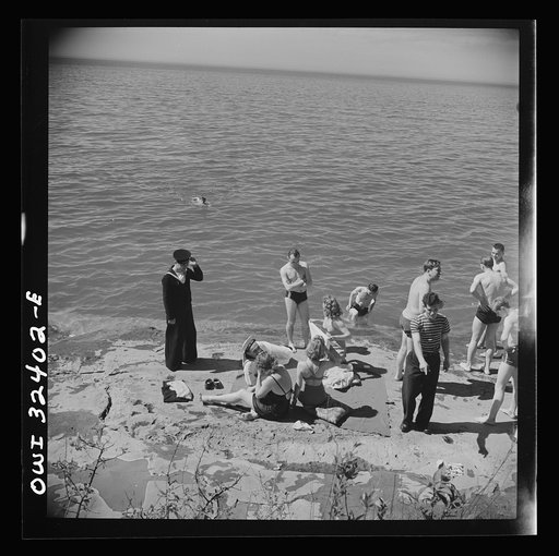 Untitled photo, possibly related to: Oswego, New York. United Nations heroes with their hostesses by Lake Ontario, at a swimming party held for visitors' entertainment during United Nations week