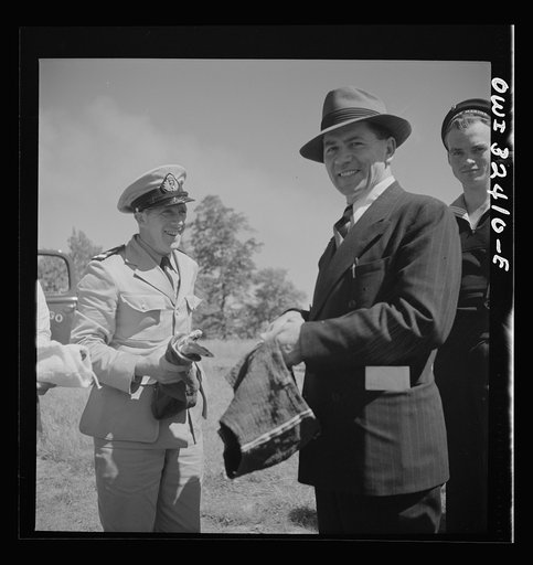 Untitled photo, possibly related to: Oswego, New York. United Nations heroes taking their pick of bathing suits loaned by the townspeople for a swimming party held for visitors' entertainment during United Nations week