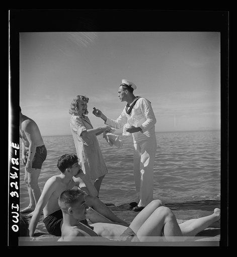 Untitled photo, possibly related to: Oswego, New York. United Nations heroes with their hostesses by Lake Ontario, at a swimming party held for visitors' entertainment during United Nations week