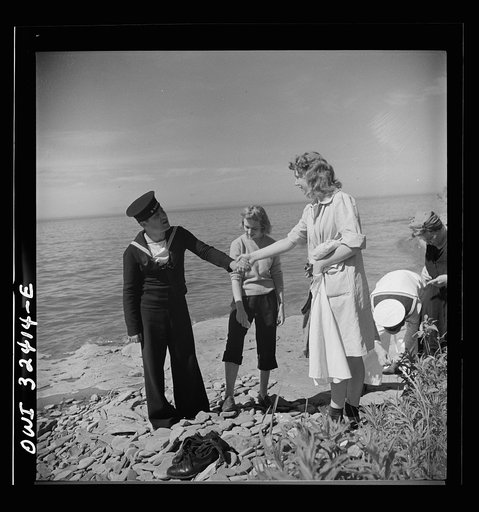 Untitled photo, possibly related to: Oswego, New York. United Nations heroes with their hostesses by Lake Ontario, at a swimming party held for visitors' entertainment during United Nations week