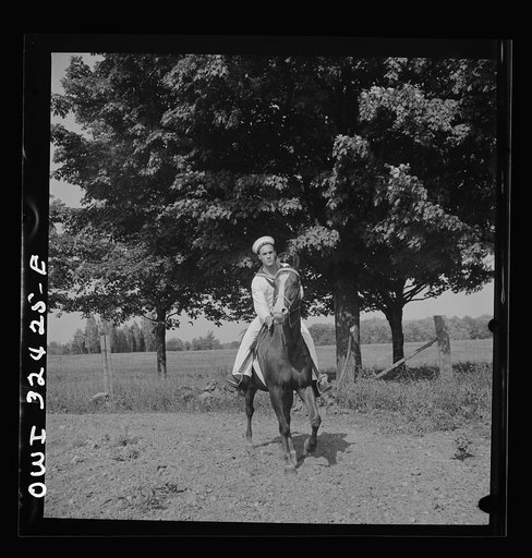 Oswego, New York. Belgian sailor riding at a farm where the heroes were entertained during United Nations week