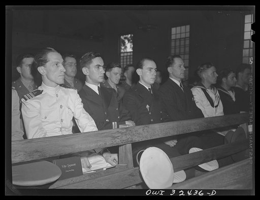 Untitled photo, possibly related to: Oswego, New York. Left to right: Polish, French, Jugoslavian, Belgian, Greek, and Norwegian fighting men attending the chapel at Fort Ontario during United Nations week