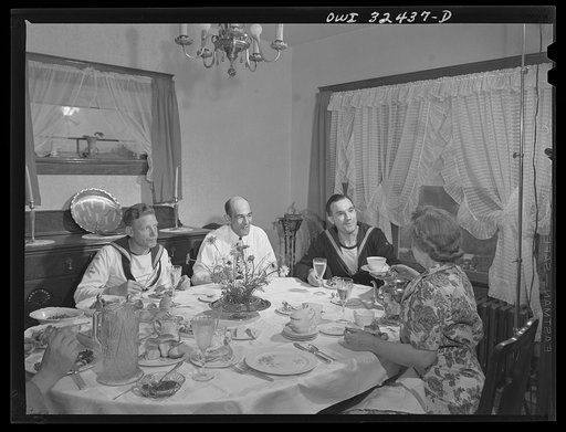 Oswego, New York. Belgian sailors having lunch in the American home where they stayed during United Nations week