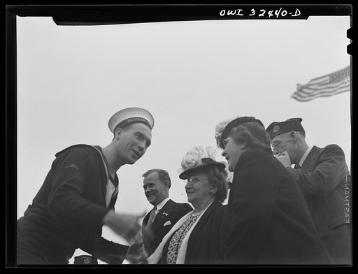 Oswego, New York. A Belgian sailor on Flag Day greeting American Legionnaires and their wives during United Nations week