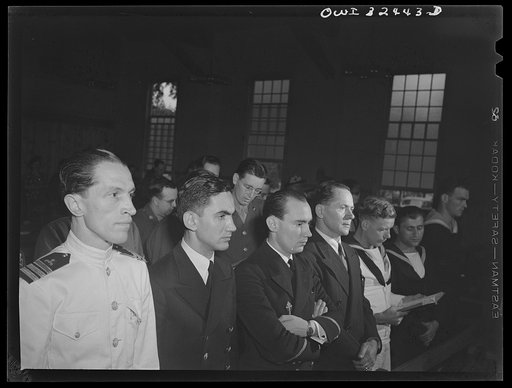 Untitled photo, possibly related to: Oswego, New York. Left to right: Polish, French, Jugoslavian, Belgian, Greek, and Norwegian fighting men attending the chapel at Fort Ontario during United Nations week