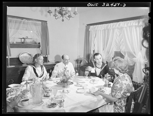 Untitled photo, possibly related to: Oswego, New York. Belgian sailors having lunch in the American home where they stayed during United Nations week
