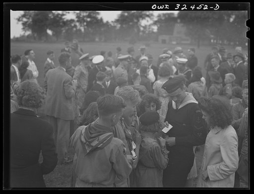 Untitled photo, possibly related to: Oswego, New York. Boy scouts getting autographs from the United Nations heroes on Flag Day during United Nations week