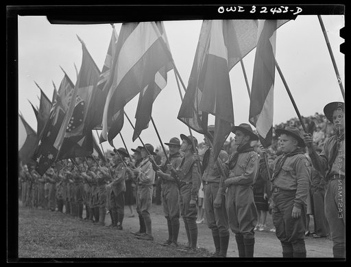 Untitled photo, possibly related to: Oswego, New York. Boy scouts carrying the United Nations flags on Flag Day during United Nations week