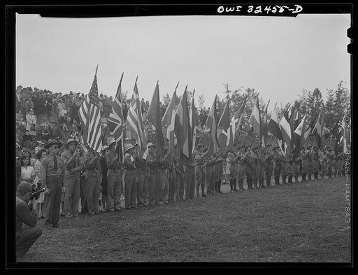 Untitled photo, possibly related to: Oswego, New York. Boy scouts carrying the United Nations flags on Flag Day during United Nations week