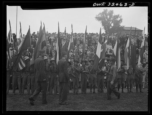Untitled photo, possibly related to: Oswego, New York. Boy scouts carrying the United Nations flags on Flag Day during United Nations week