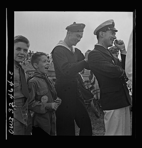 Oswego, New York. Boy scouts getting autographs from the United Nations heroes on Flag Day during United Nations week