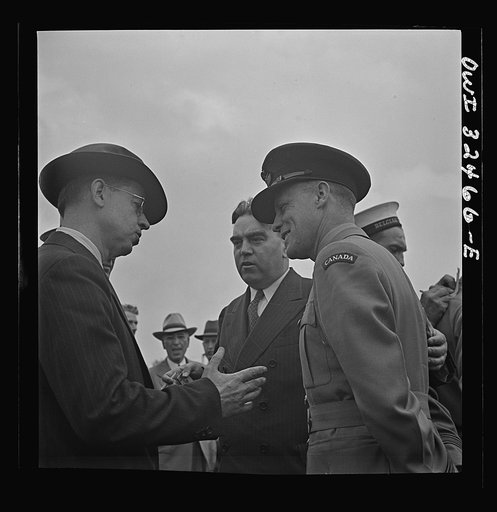 Oswego, New York. Canadian flight commander chatting with Oswegans on Flag Day during United Nations week