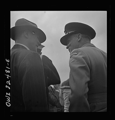 Untitled photo, possibly related to: Oswego, New York. Canadian flight commander chatting with Oswegans on Flag Day during United Nations week