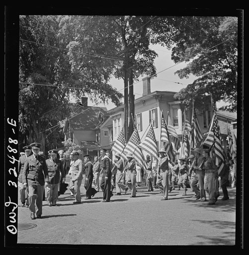 Untitled photo, possibly related to: Oswego, New York. United Nations heroes marching in the Flag Day parade during United Nations week