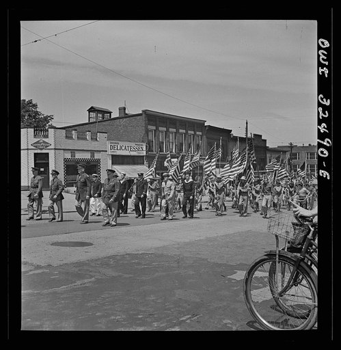 Oswego, New York. United Nations heroes marching in the Flag Day parade during United Nations week