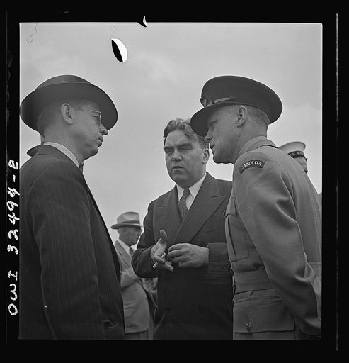 Untitled photo, possibly related to: Oswego, New York. Canadian flight commander chatting with Oswegans on Flag Day during United Nations week