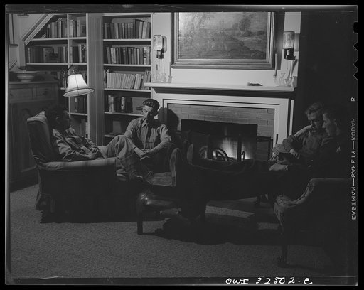 Untitled photo, possibly related to: Bar Harbor, Maine. Civil Air Patrol base headquarters of coastal patrol no. 20. Flyers relaxing in a luxurious summer home which they were able to rent for very little in the deserted Bar Harbor summer resort