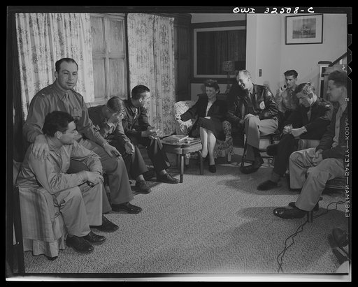 Untitled photo, possibly related to: Bar Harbor, Maine. Civil Air Patrol base headquarters of coastal patrol no. 20. An evening in the luxurious summer home rented by four of the flyers for very little in the now deserted Bar Harbor summer resort