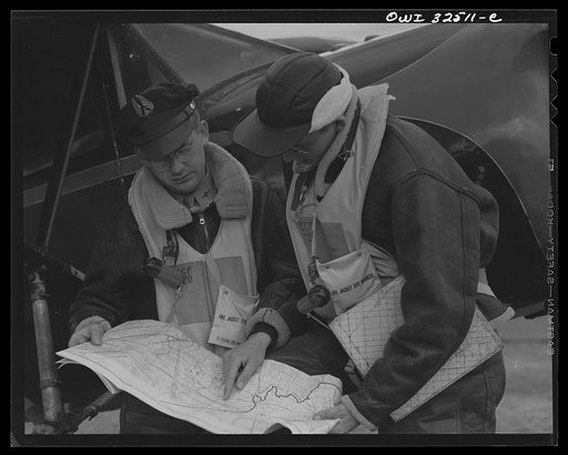 Untitled photo, possibly related to: Bar Harbor, Maine. Civil Air Patrol base headquarters of coastal patrol no. 20. Flyers in winter flying togs