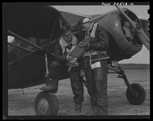 Untitled photo, possibly related to: Bar Harbor, Maine. Civil Air Patrol base headquarters of coastal patrol no. 20. Flyers in winter flying togs