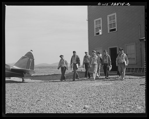 Bar Harbor, Maine. Civil Air Patrol base headquarters of coastal patrol no. 20. Dusk patrol leaving the intelligence room to go to their planes