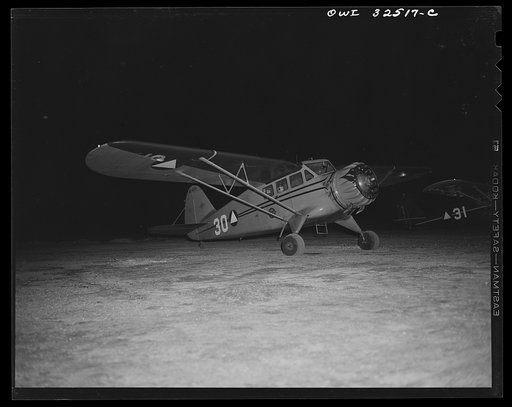 Bar Harbor, Maine. Civil Air Patrol base headquarters of coastal patrol no. 20. Patrol plane ready for takeoff on dawn patrol