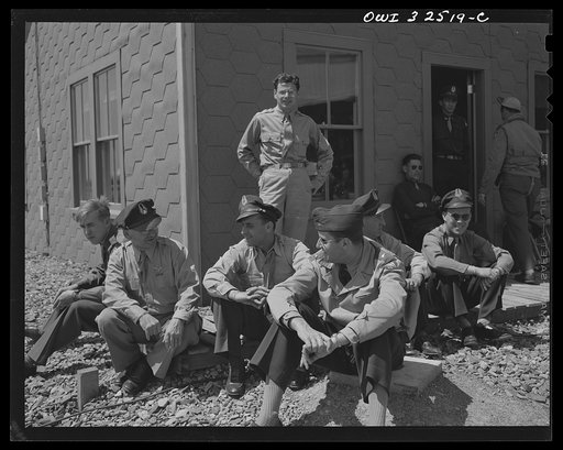 Untitled photo, possibly related to: Bar Harbor, Maine. Civil Air Patrol base headquarters of coastal patrol no. 20. Dusk patrol leaving the intelligence room to go to their planes