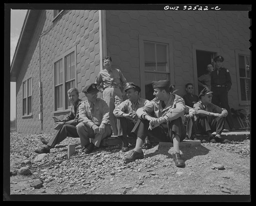 Untitled photo, possibly related to: Bar Harbor, Maine. Civil Air Patrol base headquarters of coastal patrol no. 20. Dusk patrol leaving the intelligence room to go to their planes
