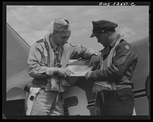 Bar Harbor, Maine. Civil Air Patrol base headquarters of coastal patrol no. 20. A pilot and an observer before taking off on dusk patrol
