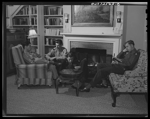 Bar Harbor, Maine. Civil Air Patrol base headquarters of coastal patrol no. 20. Flyers relaxing in a luxurious summer home which they were able to rent for very little in the deserted Bar Harbor summer resort