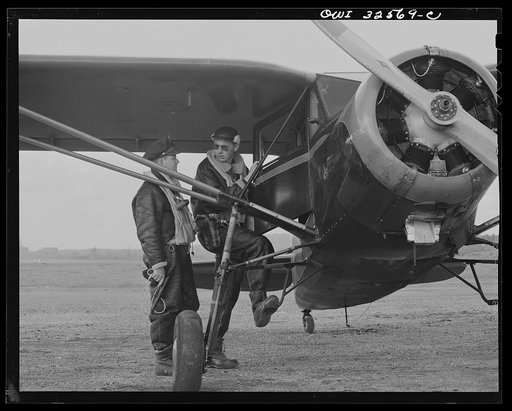Untitled photo, possibly related to: Bar Harbor, Maine. Civil Air Patrol base headquarters of coastal patrol no. 20. Flyers in winter flying togs