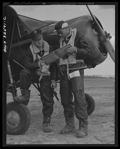 Bar Harbor, Maine. Civil Air Patrol base headquarters of coastal patrol no. 20. Flyers in winter flying togs