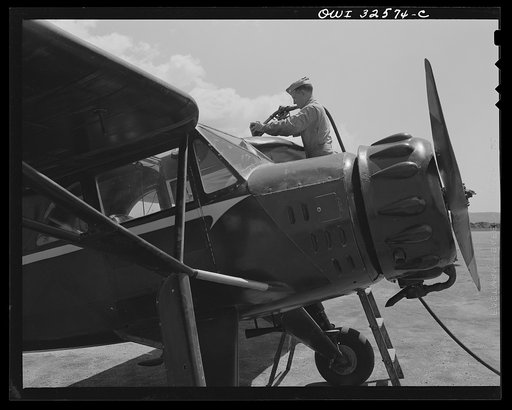 Bar Harbor, Maine. Civil Air Patrol base headquarters of coastal patrol no. 20. Gassing a plane