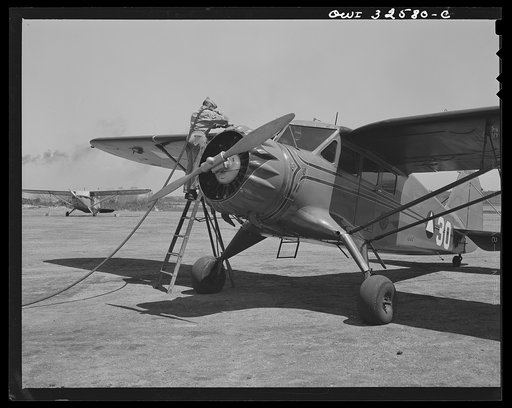 Bar Harbor, Maine. Civil Air Patrol base headquarters of coastal patrol no. 20. Gassing a plane