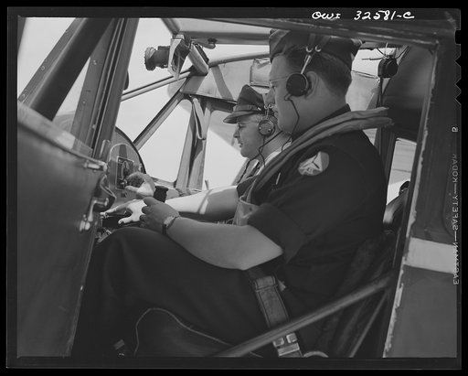 Bar Harbor, Maine. Civil Air Patrol base headquarters of coastal patrol no. 20. Pilot and observer ready for the take off