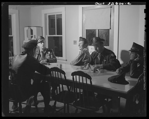 Bar Harbor, Maine. Civil Air Patrol base headquarters of coastal patrol no. 20. Dawn patrol warming up in the base canteen before taking the air
