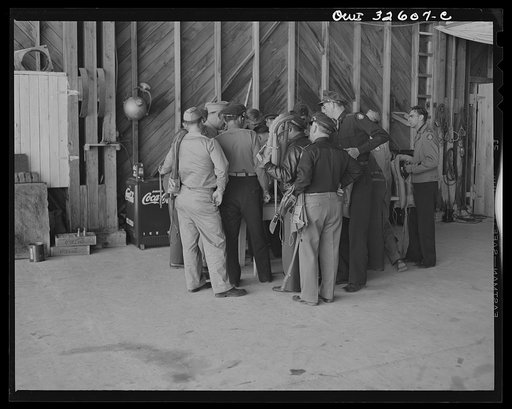 Bar Harbor, Maine. Civil Air Patrol base headquarters of coastal patrol no. 20. Routine inspection of "Mae West" life preserving vests worn by flyers on all patrols over water