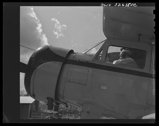 Bar Harbor, Maine. Civil Air Patrol base headquarters of coastal patrol no. 20. Pilot ready for a takeoff