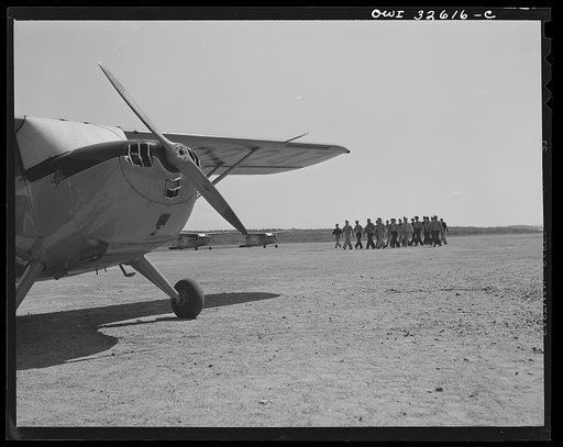 Bar Harbor, Maine. Civil Air Patrol base headquarters of coastal patrol no. 20. Pilot and observers in marching maneuvers during their calisthenics period