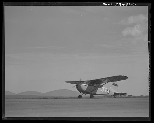 Bar Harbor, Maine. Civil Air Patrol base headquarters of coastal patrol no. 20. Taking off for the dawn patrol