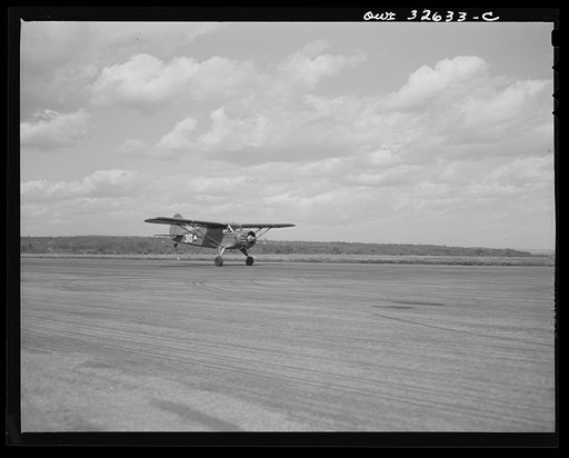 Bar Harbor, Maine. Civil Air Patrol base headquarters of coastal patrol no. 20. Making a landing after completing a patrol