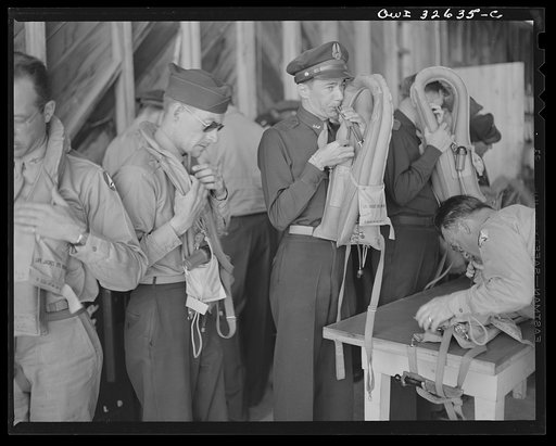 Bar Harbor, Maine. Civil Air Patrol base headquarters of coastal patrol no. 20. Routine inspection of "Mae West" life-preserving vests worn by flyers on all patrols over water
