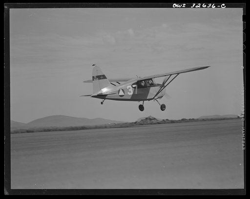 Bar Harbor, Maine. Civil Air Patrol base headquarters of coastal patrol no. 20. Taking off for patrol duty