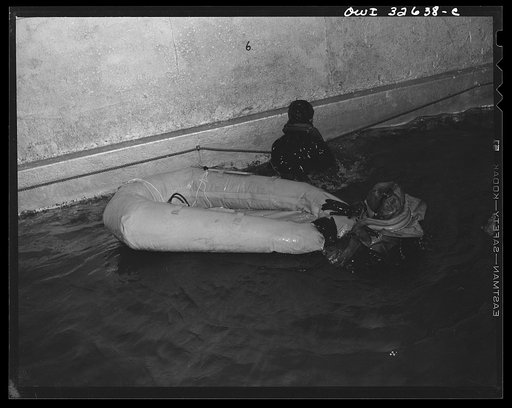 Untitled photo, possibly related to: Bar Harbor, Maine. Civil Air Patrol base headquarters of coastal patrol no. 20. Testing rubber crash boat in the swimming pool